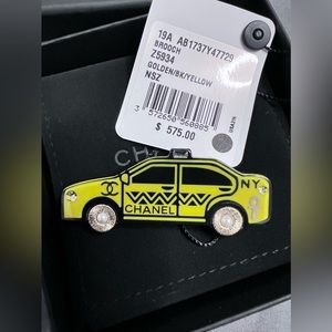 CHANEL YELLOW TAXI BROACH